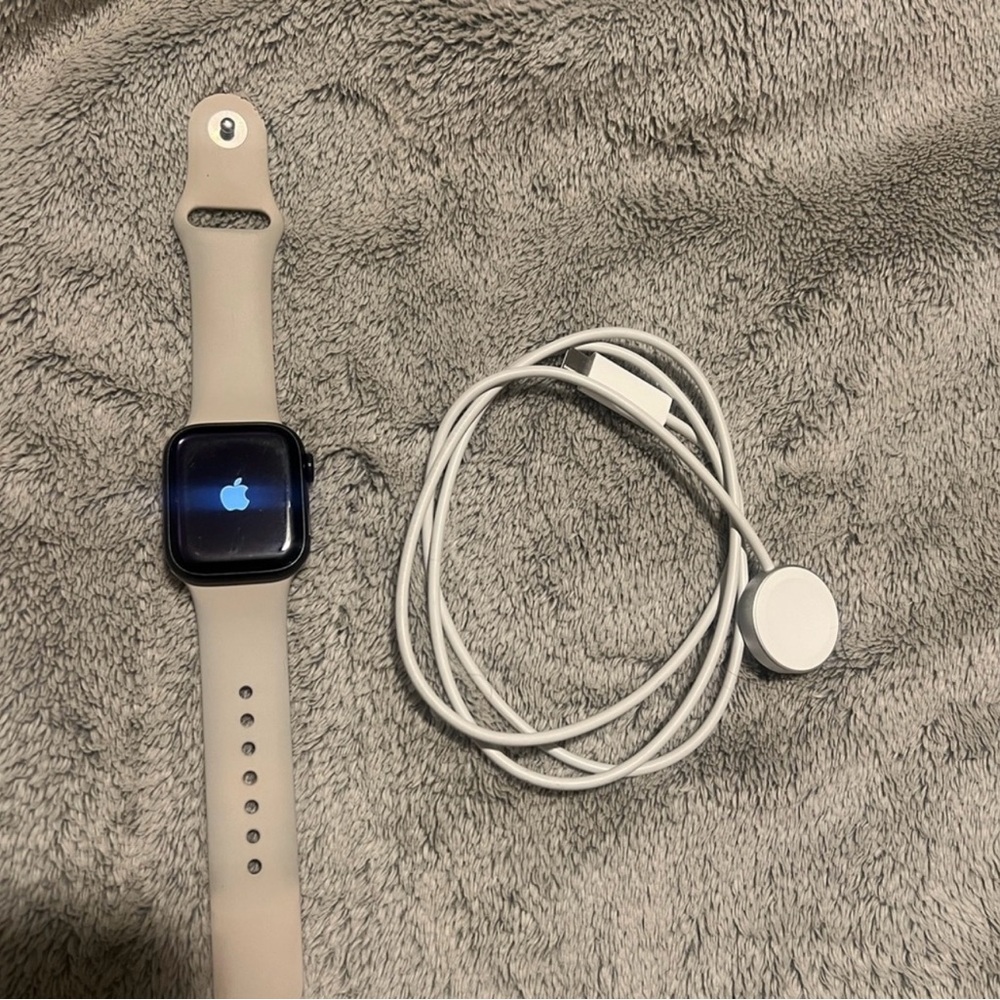 Smartwatch with Beige Band and Charger
